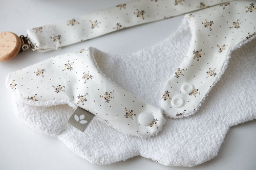 Babete Impermeável Florido Bege