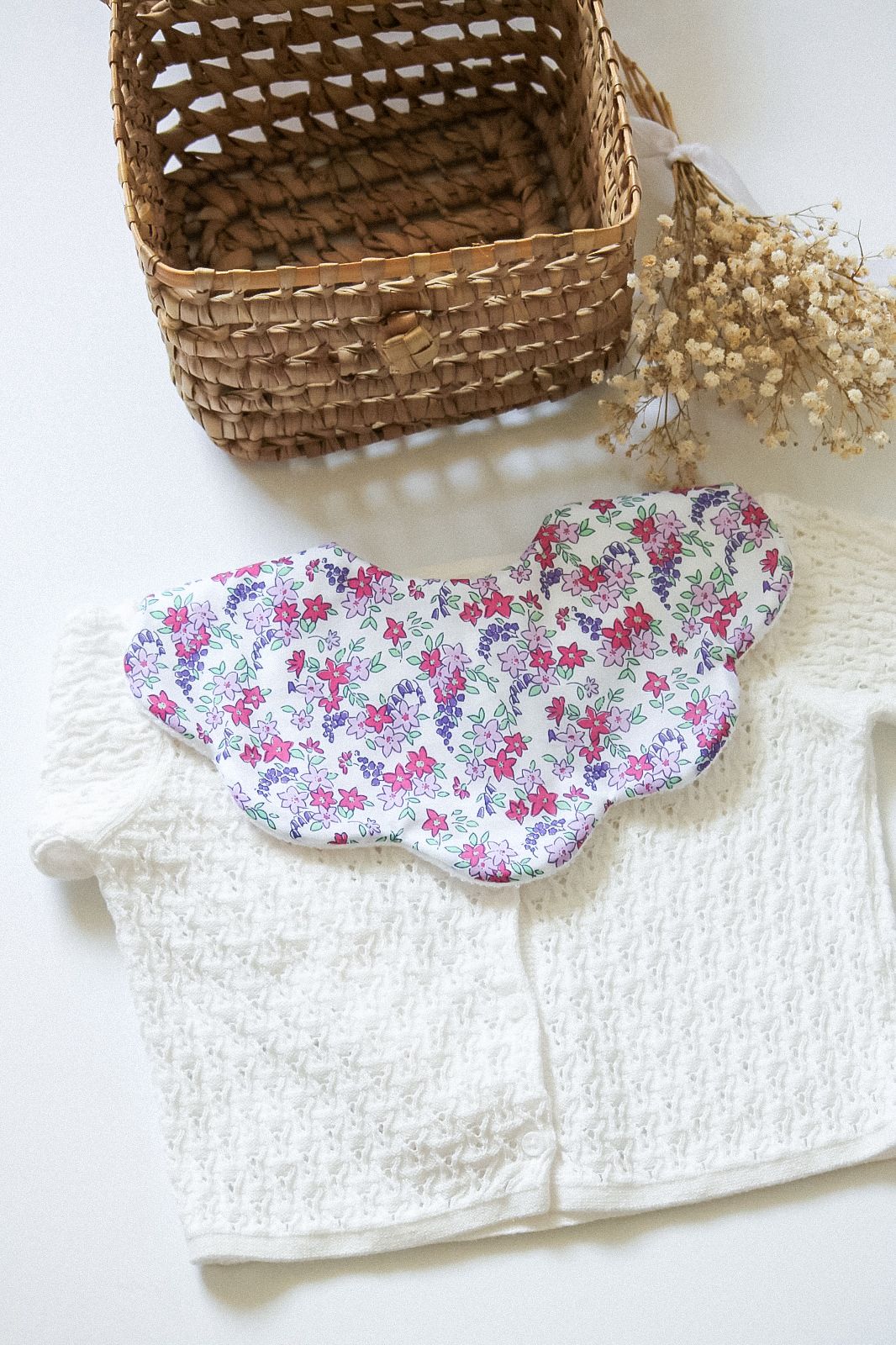 Babete Impermeável florido rosa