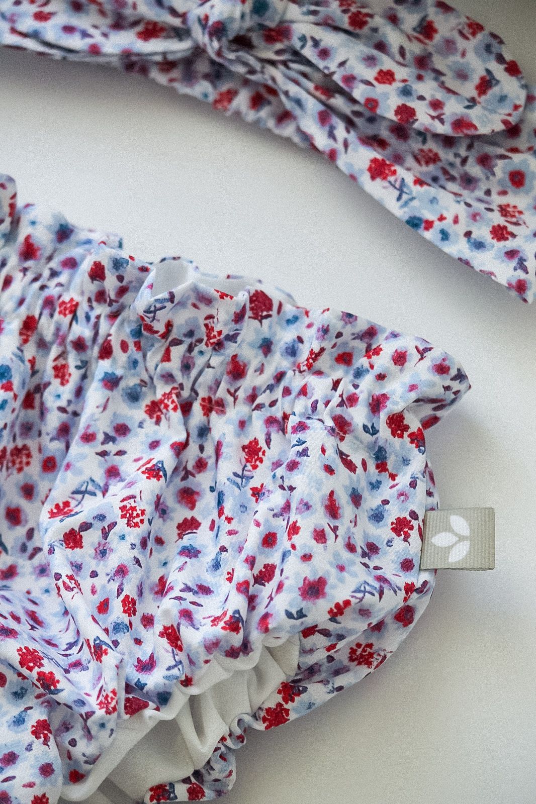 Tapa Fraldas Florido Vermelho e Azul